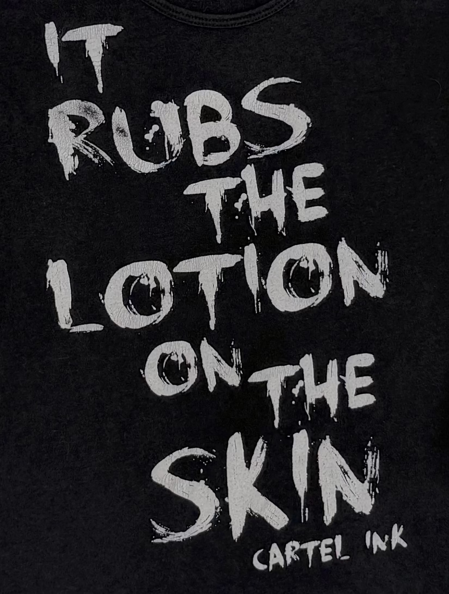 It Rubs The Lotion on the Skin Women's Tank Top